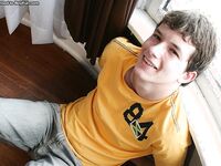 Good-looking brunette twunk Devin Moss shows off his suckable big cock