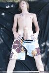 Amateur gay with amazing abs Skyler flaunts his big cock outdoors