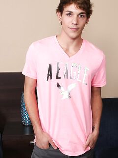 Sexy teen gay Malik doffs his pink shirt and pulls out his