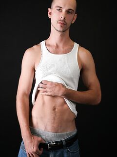 Skinny gay boytoy Brent massaging his big cock and asshole in a