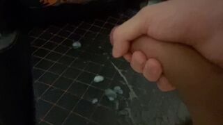 A young dude jerks off an uncut huge cock and ends up