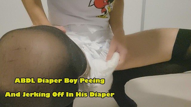 Diaper Boytoy Peeing And Jerking Off In His Diaper