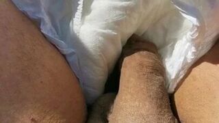 Flashing My dick on the beach, has nappy on me