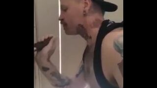 Sucking BBC at a gloryhole