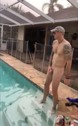 Muscular Hunk Jerks Off by the Pool with a Cigarette