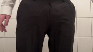 Nappy twink wearing a full nappy under his suit at work