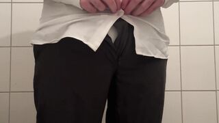 Nappy twink wearing a full nappy under his suit at work