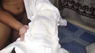 young guy urinates his nappy and masturbates