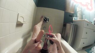 Pup twink in a nappy in the bath tub to play with