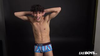 Curly twink boy shows off his slim body on webcam