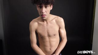 Curly twink boy shows off his slim body on webcam