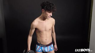 Curly twink boy shows off his slim body on webcam