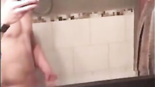 Muscular Twink Strokes His Big Cock in Bathroom Solo