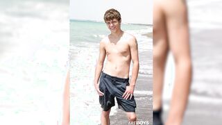 Two nude teen guys have fun on the beach