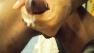 Black guy jacks off his big cock and cums hard