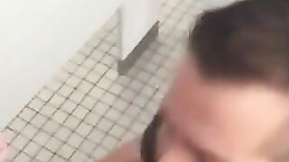 Hunk gives blowjob in a public restroom - amateur gay porn