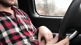Stroking my big cock while driving