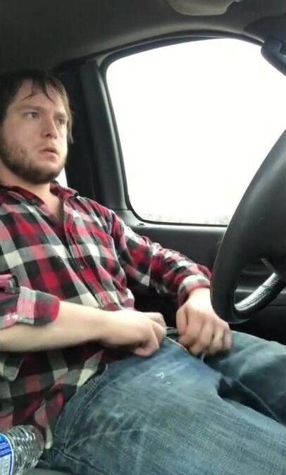Stroking my big cock while driving