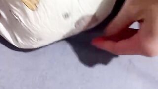 Squishing my full diaper - video 2