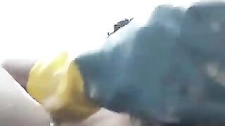 Black boy in rubbergloves