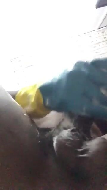 Black boy in rubbergloves