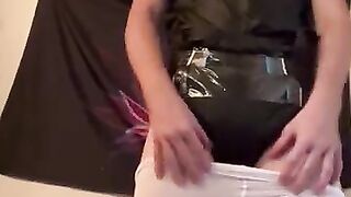 Diaper boy putting on tights