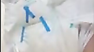 Diaper Boy Pees into already soaked diaper