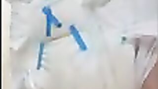 Diaper Boy Pees into already soaked diaper