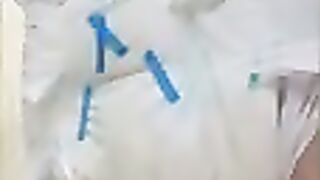 Diaper Boy Pees into already soaked diaper