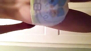 Diaper Boy in Pampers Showing Off