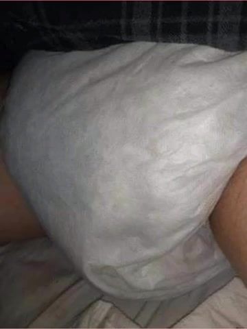 Diaper Boy Rubs His Diaper
