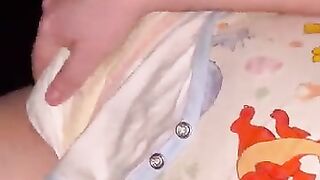 Diaper boy moans while cumming into diaper