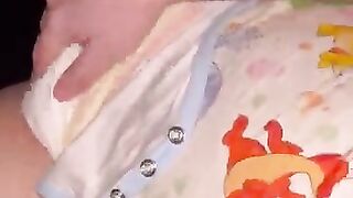 Diaper boy moans while cumming into diaper