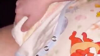Diaper boy moans while cumming into diaper