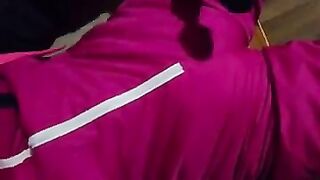 Diaper boy in pink snowsuit