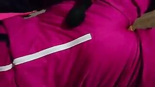 Diaper boy in pink snowsuit