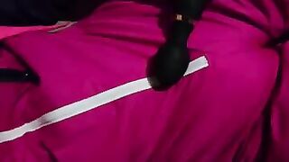 Diaper boy in pink snowsuit