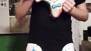 Diaper boy plays guitar