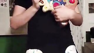 Diaper boy plays guitar