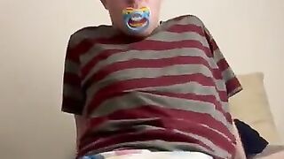 Diaper boy showing off his super wet padding