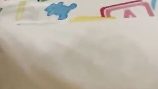 Boy wetting his diaper
