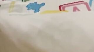 Boy wetting his diaper