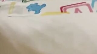 Boy wetting his diaper