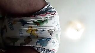 Boy wets and messes his diaper - video 2