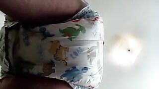 Boy wets and messes his diaper - video 2