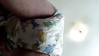 Boy wets and messes his diaper - video 2