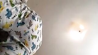 Boy wets and messes his diaper - video 2