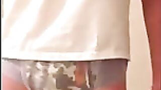 Boy wets and messes his diaper