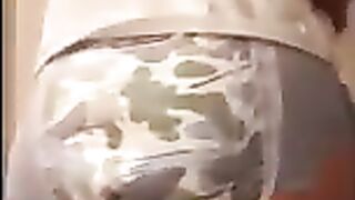 Boy wets and messes his diaper