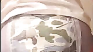 Boy wets and messes his diaper